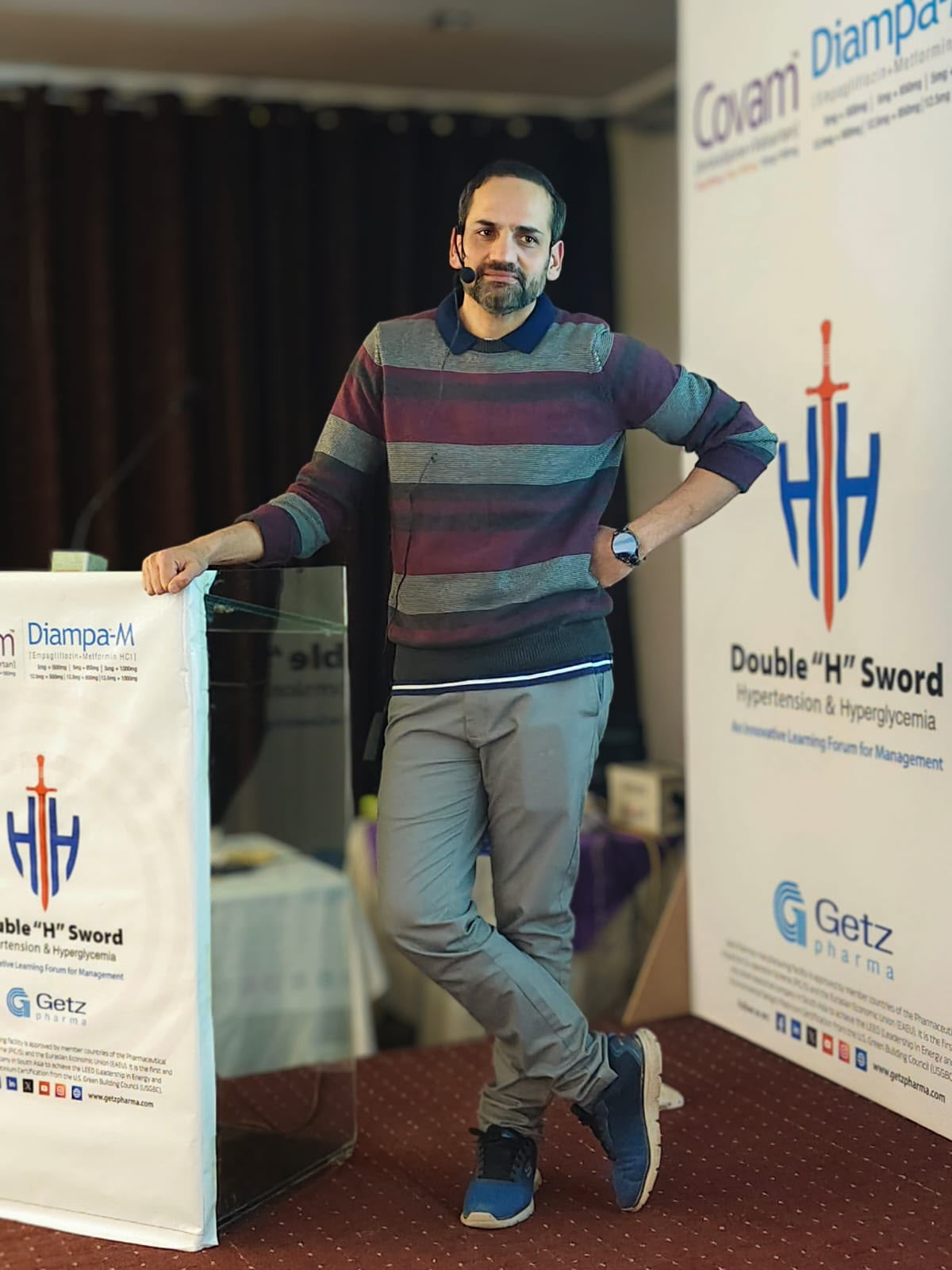Dr Khan presenting at a medical event